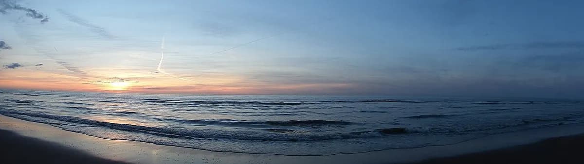 Belgian coast sunset panorama near Duinbergen